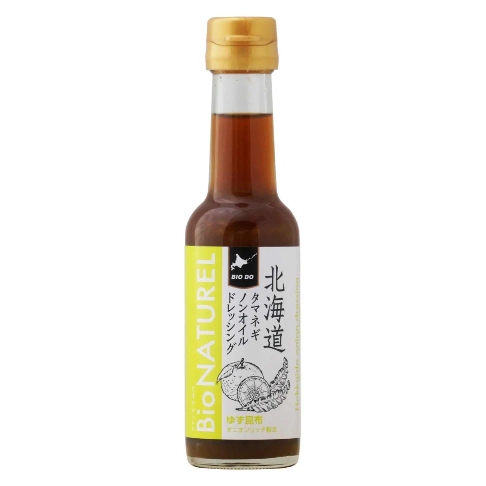 Bottle of Bio Naturel sauce with a gold cap on a white background