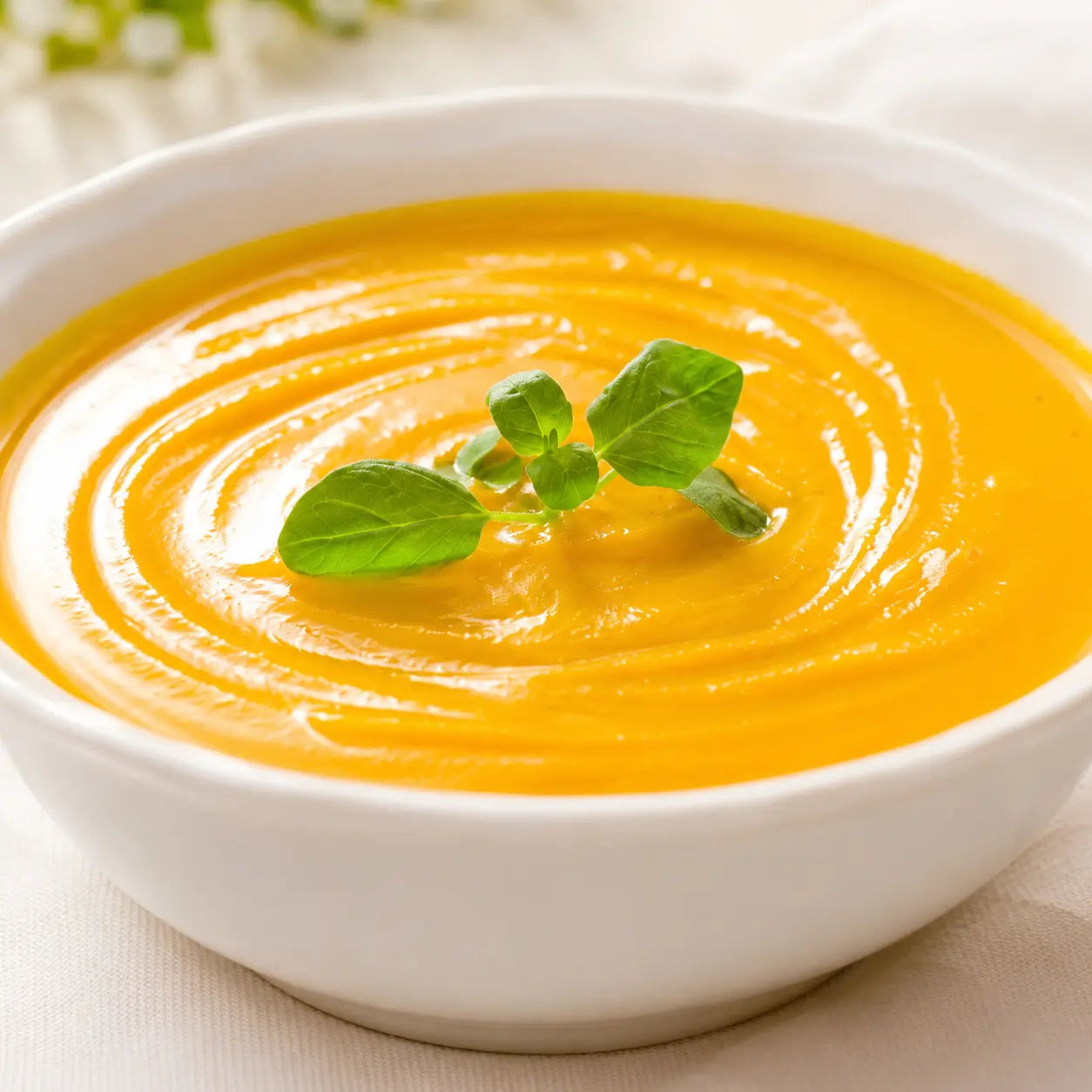 Close-up of Hokkaido Creamy Rich Pumpkin Potage showing thick, velvety golden soup texture